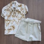 طقم بناتي كنزة وشورت جلد